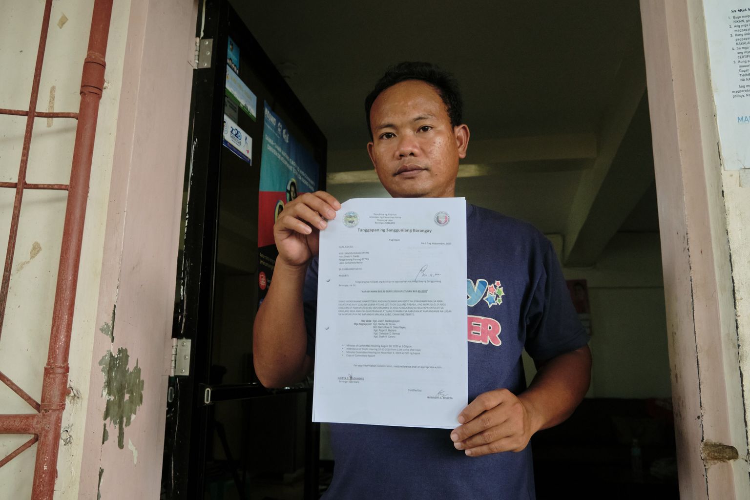 Barangay Councilor Joel Madlangbayan exhibits a copy of the child labor ordinance he authored. The local legislation entitled “Ordinance No. 50 Series 2020” seeks to prohibit youth aged 17 years old and below from engaging in work in extremely dangerous jobs including mining.